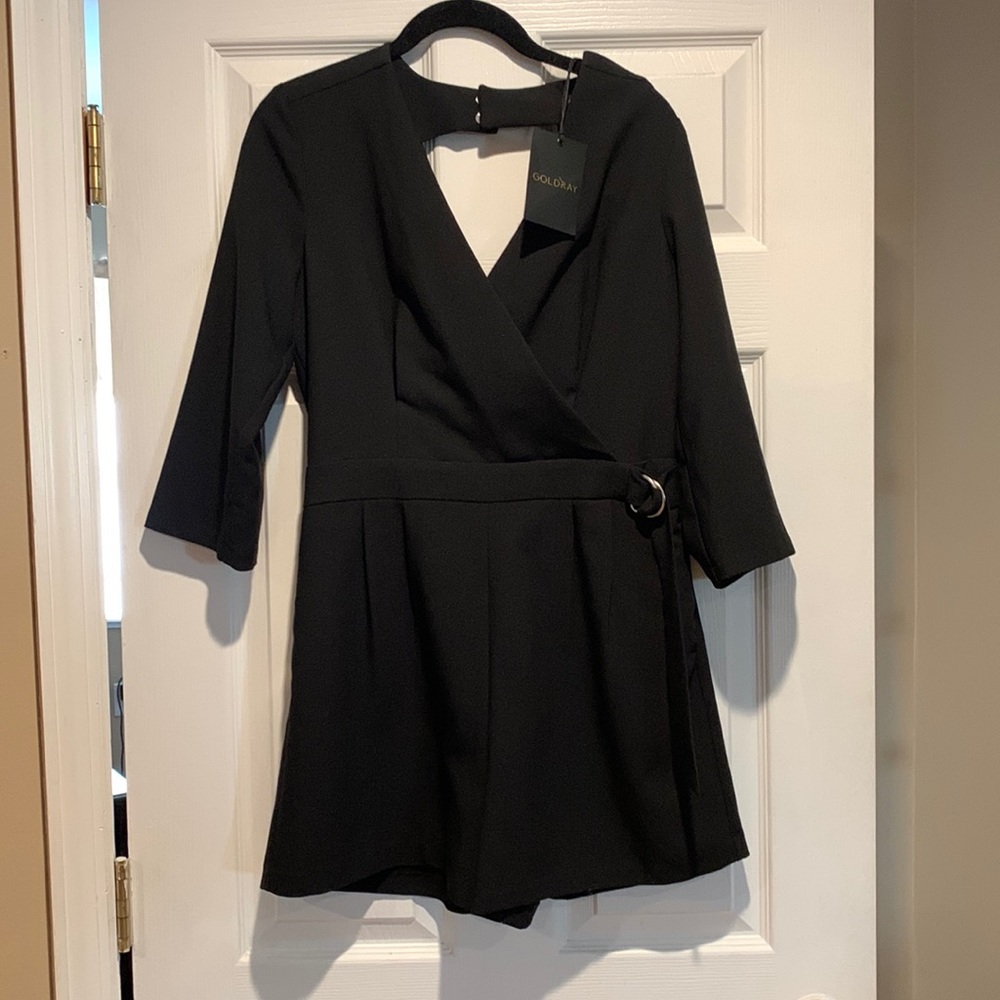 Black romper with clasp in the back waist tie
